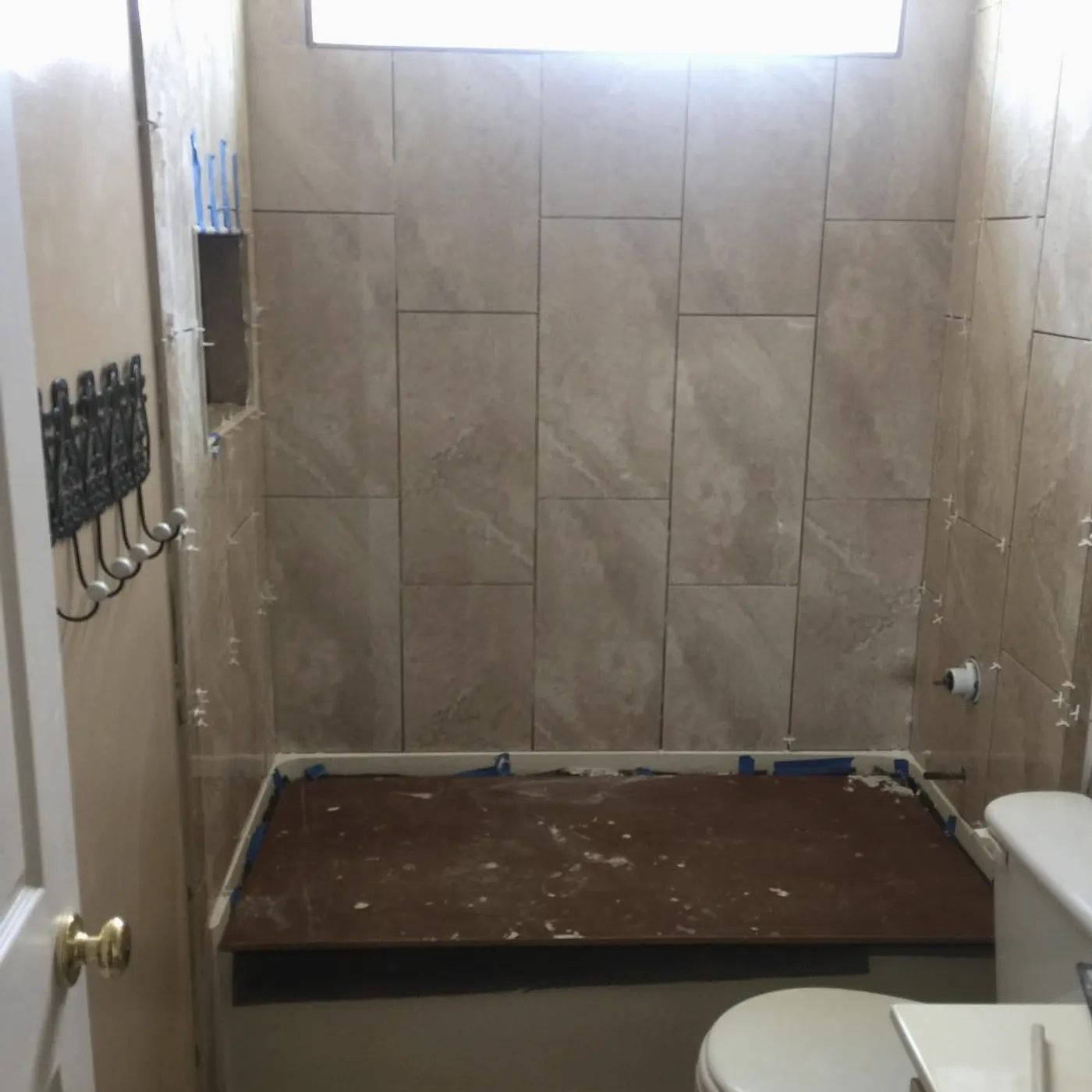 Shower bench and wall tile before the final grout and glass